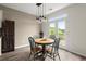 Eat-in kitchen features backyard access through beautiful french doors at 216 Toonigh Way, Canton, GA 30115