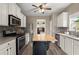 Charming kitchen featuring stainless appliances and an island at 216 Toonigh Way, Canton, GA 30115