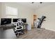Bright office with a desk, chair, and a treadmill, perfect for working out at 216 Toonigh Way, Canton, GA 30115