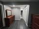 Dresser and closet with dark wood floors at 2805 Ne Expressway Unit A24, Atlanta, GA 30345