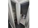 Walk in closet with shelves open to the bathroom at 2805 Ne Expressway Unit A24, Atlanta, GA 30345