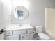 Bathroom featuring a vanity, toilet, and shower/tub combo with gray paint at 2928 George Busbee Pkwy, Kennesaw, GA 30144