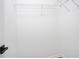 Walk-in closet with rod and shelving for storage and organization, and neutral paint at 2928 George Busbee Pkwy, Kennesaw, GA 30144