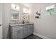 Bathroom featuring granite countertop, dual sinks and modern fixtures at 3153 Bonway Dr, Decatur, GA 30032