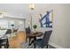 Open dining area with stylish furniture, hardwood floors, and modern lighting at 3153 Bonway Dr, Decatur, GA 30032