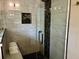 Walk-in shower featuring elegant tile work and a convenient built-in bench at 3153 Bonway Dr, Decatur, GA 30032