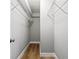 Walk-in closet with a door and wire racks for ample storage space at 3153 Bonway Dr, Decatur, GA 30032