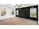 This spacious bedroom includes 3 large windows and designer accent wall at 3444 Underwood Se Ct, Conyers, GA 30013
