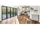 Open kitchen concept with modern appliances and sliding doors to a deck at 3444 Underwood Se Ct, Conyers, GA 30013