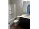 Clean bathroom showcases a shower/tub combo, single sink vanity, and a neutral color palette at 4180 Cavalier Way, Duluth, GA 30097