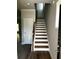 Entryway featuring wood flooring and stairway with decorative molding at 4180 Cavalier Way, Duluth, GA 30097