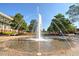 Large fountain with colorful seating and grassy areas in the background at 4180 Cavalier Way, Duluth, GA 30097