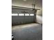 Spacious garage with an automatic door and plenty of room for storage and parking at 4180 Cavalier Way, Duluth, GA 30097