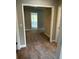 Carpeted hallway provides access to other rooms at 4180 Cavalier Way, Duluth, GA 30097