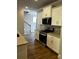 Modern kitchen with stainless steel appliances and granite countertops at 4180 Cavalier Way, Duluth, GA 30097