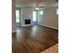 Bright living room with a cozy fireplace and large windows at 4180 Cavalier Way, Duluth, GA 30097