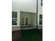 Covered patio area with double doors for easy indoor/outdoor living at 4180 Cavalier Way, Duluth, GA 30097