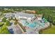 Great outdoor water park area with slides, pools, seating and parking at 4180 Cavalier Way, Duluth, GA 30097