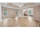 Primary bedroom featuring hardwood flooring and trey ceilings at 4613 Creek Forest Ct, Lilburn, GA 30047