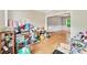 Spacious living room with hardwood floors and lots of natural light at 4613 Creek Forest Ct, Lilburn, GA 30047