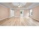 Spacious main bedroom featuring tray ceilings, and lots of natural light at 4613 Creek Forest Ct, Lilburn, GA 30047
