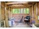 Shed interior featuring wood paneled walls and floor at 5427 Highway 81, Loganville, GA 30052