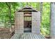 Wooden shed with wood deck at 5427 Highway 81, Loganville, GA 30052