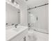 Modern bathroom features a glass shower, soaking tub, and marble countertop at 2339 Eastwood Dr, Snellville, GA 30078
