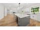 Open concept gourmet kitchen with island and living room at 2339 Eastwood Dr, Snellville, GA 30078