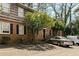 Charming brick building featuring ample parking and mature trees in a landscaped surrounding at 3626 Buford Ne Hwy # C2, Brookhaven, GA 30329