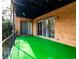 A quaint, covered patio with artificial turf, perfect for enjoying the outdoors at 3626 Buford Ne Hwy # C2, Brookhaven, GA 30329