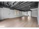 Finished basement with recessed lighting, painted ceiling, and light wood-look flooring at 6119 Fairlong Nw Run, Acworth, GA 30101