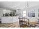Open kitchen with stainless steel appliances, granite countertops, and bright breakfast nook at 6119 Fairlong Nw Run, Acworth, GA 30101