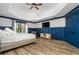 Spacious main bedroom features a ceiling fan, recessed lighting, wood floors and a scenic view from its window at 6119 Fairlong Nw Run, Acworth, GA 30101