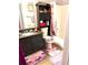 Small bathroom featuring a shower-tub combo, dark cabinets, and butterfly-themed decor at 9400 Roberts Dr # 7M, Atlanta, GA 30350
