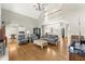 Spacious living room features hardwood floors, high ceilings and natural light at 13090 Magnolia Crescent Dr, Roswell, GA 30075