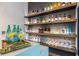 Bar shelving featuring a variety of spirits at 4052 Loch Highland Ne Pass, Roswell, GA 30075