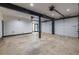 Spacious three car garage with white doors and high ceilings at 4052 Loch Highland Ne Pass, Roswell, GA 30075