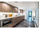 Modern kitchen features sleek cabinetry, stainless steel appliances, and ample counter space at 4052 Loch Highland Ne Pass, Roswell, GA 30075