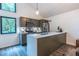 Modern kitchen features stainless steel appliances, white countertops, and a kitchen island at 4052 Loch Highland Ne Pass, Roswell, GA 30075
