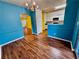 Elegant dining room with hardwood floors and a decorative chandelier at 4842 Hairston Park Sq, Stone Mountain, GA 30083
