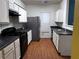 Bright kitchen equipped with stainless steel refrigerator and black appliances at 4842 Hairston Park Sq, Stone Mountain, GA 30083