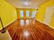 Bright and airy living room boasting gleaming hardwood floors and natural light at 4842 Hairston Park Sq, Stone Mountain, GA 30083