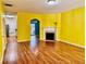 Bright living room featuring hardwood floors, a fireplace, and an open layout at 4842 Hairston Park Sq, Stone Mountain, GA 30083