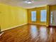 Open living room showcasing hardwood floors and bright wall paint at 4842 Hairston Park Sq, Stone Mountain, GA 30083