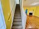 Carpeted stairway connecting the different floors of the home, showcasing access to living areas at 4842 Hairston Park Sq, Stone Mountain, GA 30083