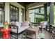 Cozy front porch with comfortable seating area, perfect for outdoor relaxation at 541 Greenwood Ne Ave, Atlanta, GA 30308