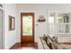 Bright living room with hardwood floors and front door at 541 Greenwood Ne Ave, Atlanta, GA 30308
