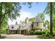 Stately home with a turret, mature trees, and manicured gardens at 675 W Paces Ferry Nw Rd # 11, Atlanta, GA 30327