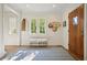 Inviting foyer features a hardwood floor, entry door, and decoratively placed hats at 675 W Paces Ferry Nw Rd # 11, Atlanta, GA 30327